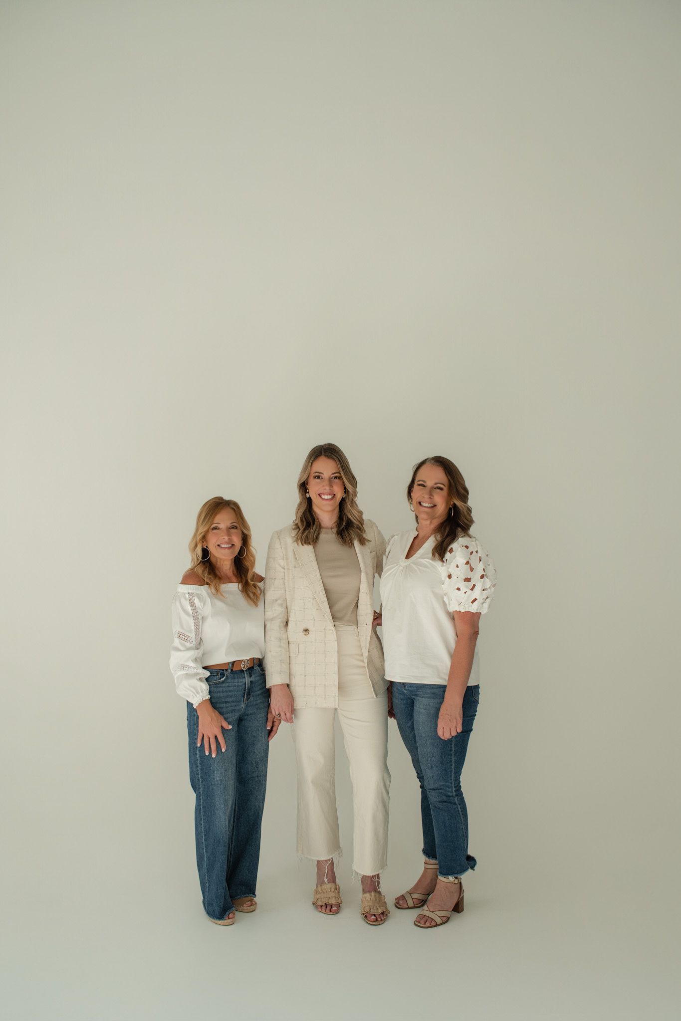 Chloe Golden with Chloe & Co. Signature Events associate planners Tracie Craft and Angie Aldret